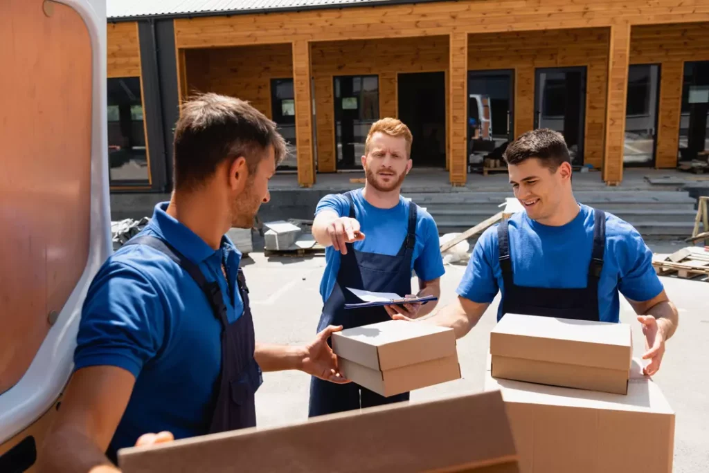 Apartment movers carrying boxes in Dubai